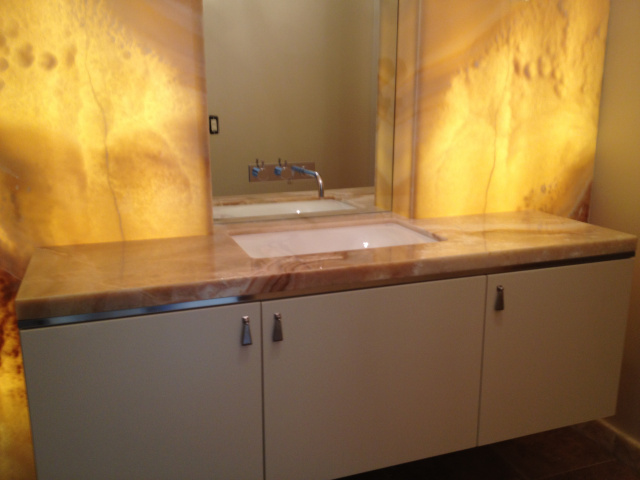 "Honey Onyx" counter and back lit wall