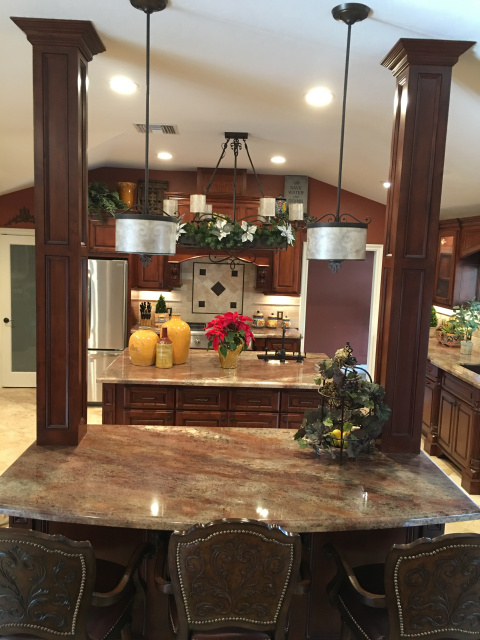 Traditional kitchen in "Bordeaux" Granite slab.